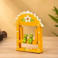 Сувенир "Лягушата на качелях" дерево 10х3,5х15 см, цв.  оранжевый Сувенир "Лягушата на качелях" дерево 10х3,5х15 см, цв.  оранжевый