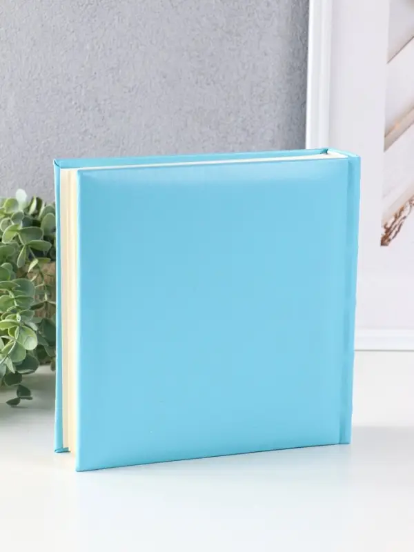 Фотоальбом 200 фото 10X15см, "Малыш", голубой,бум.карм.с мемо, книжн. пер-т