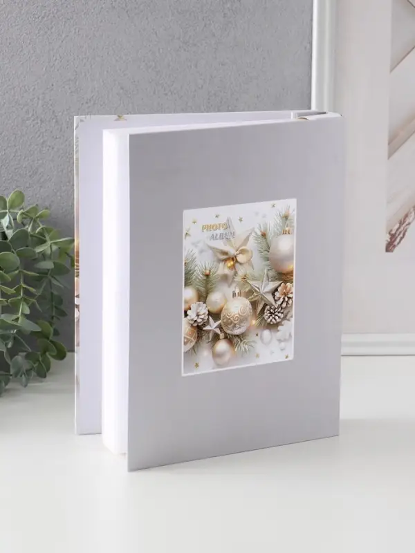 Фотоальбом на 200 фото 10х15 см Фотоальбом на 200 фото 10х15 см "Ёлочные игрушки" в коробке тиснение серебро 6х20,5х26 см