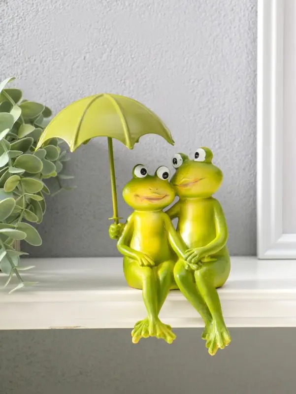 Сувенир полистоун "Влюблённые лягушата под зонтом" на полку 14 см