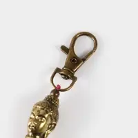 Брелок-кисточка "Будда" 17 см, цв. фуксия, золотистый Брелок-кисточка "Будда" 17 см, цв. фуксия, золотистый