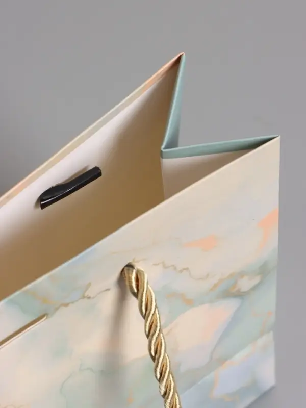 Пакет подарочный "Мрамор" , голубой , с бантиком , 19 х 15 х 7 см