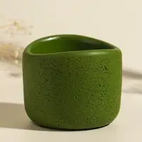 Свеча в вулканическом подсвечнике "Изгиб" зелёная 8,3х8,5х7 см