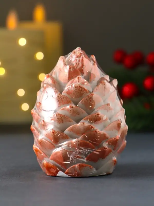 Свеча "Шишка 80х60 мм с оранжевым декором