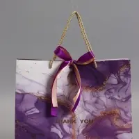 Пакет подарочный "Мрамор", фиолетовый с бантиком, 32 х 25 х 11 см