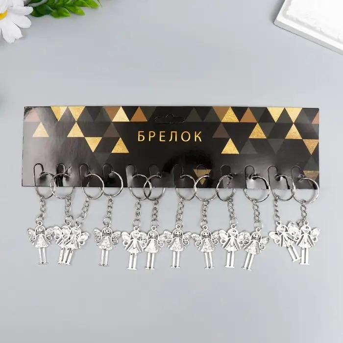 Брелок металл "Девочка-фея" серебро 3х2,7 см