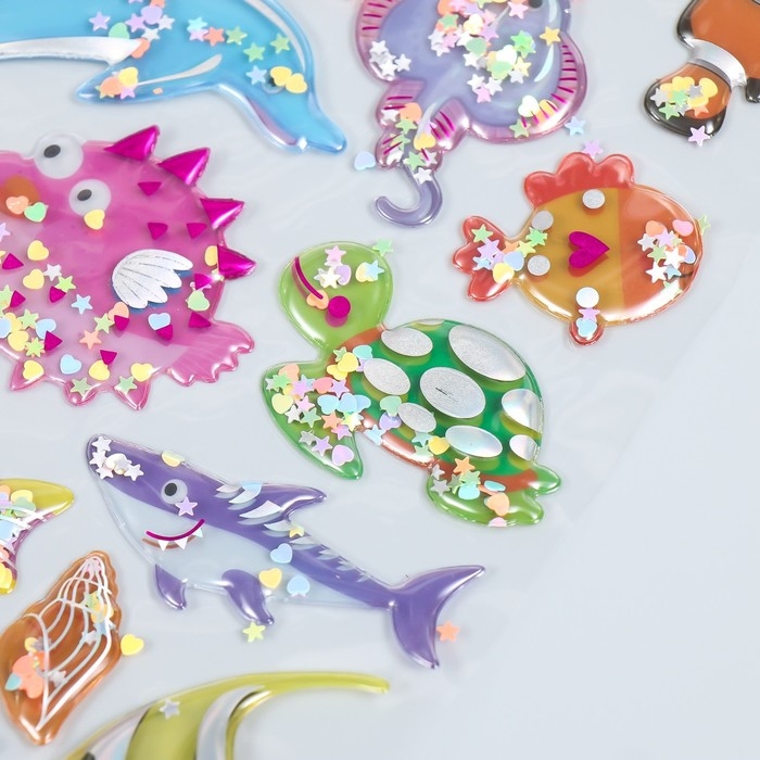 Наклейка пластик объёмные с глиттером Наклейка пластик объёмные с глиттером "Динозавры/Рыбы" золото/серебро МИКС