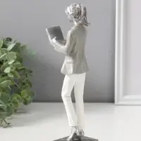 Сувенир полистоун "Девушка в бело-сером костюме с компьютером в наушниках" 24 см