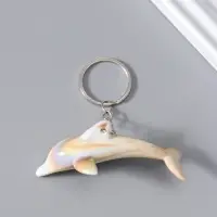Брелок пластик "Дельфин" под песочный мрамор 7,4х2,8х2 см