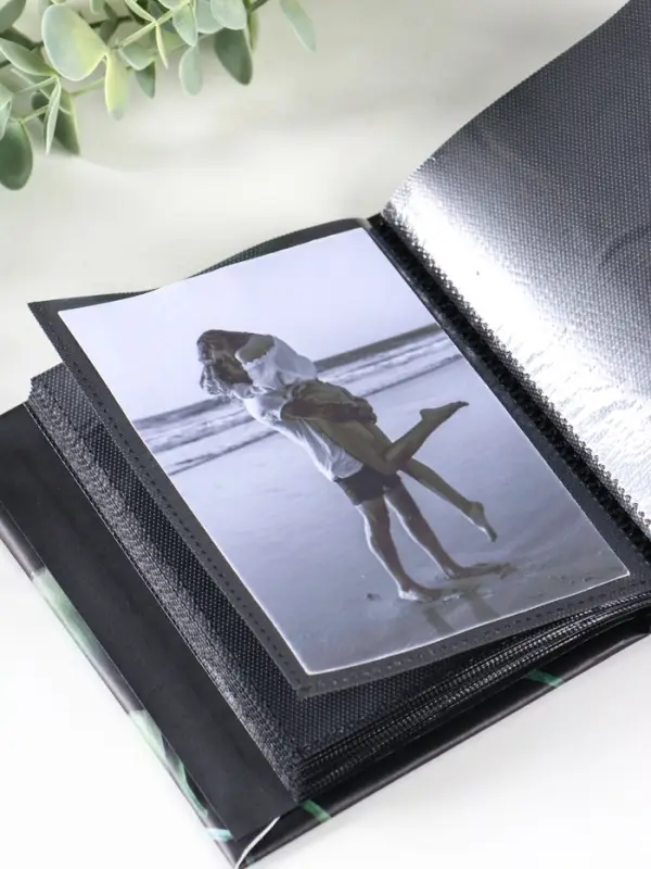 Фотоальбом "Цветы" 100ф 10X15см, ПП карм., черные страницы, черные страницы