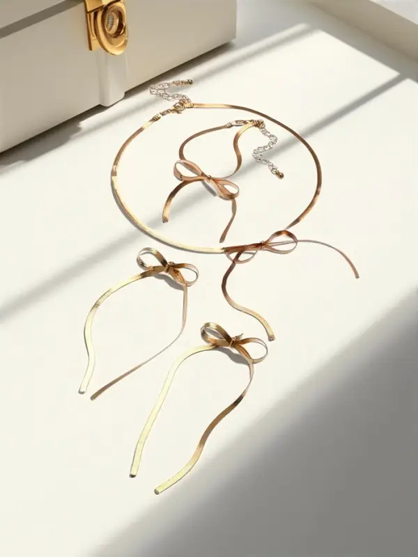 Набор 3 предмета: колье, серьги, браслет «Бантик», цвет золото Набор 3 предмета: колье, серьги, браслет «Бантик», цвет золото