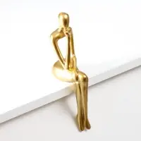 Сувенир полистоун "Девушка в раздумьях" золото 23х5х9 см Сувенир полистоун "Девушка в раздумьях" золото 23х5х9 см