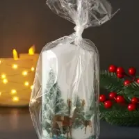 Свеча столб 70х140мм с декором, олени Свеча столб 70х140мм с декором, олени