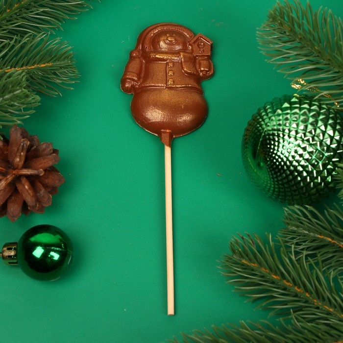 Новый год. Фигура из молочного шоколада Новый год. Фигура из молочного шоколада "Снежная баба", на палочке , 20 г ± 5 %