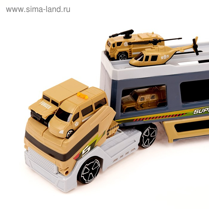 Грузовик &laquo;Трейлер&raquo; с 6 машинами и вертолетом