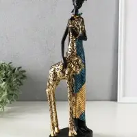 Сувенир полистоун "Африканка в платье с жирафом" бензиновый синий 13х9,5х40 см Сувенир полистоун "Африканка в платье с жирафом" бензиновый синий 13х9,5х40 см