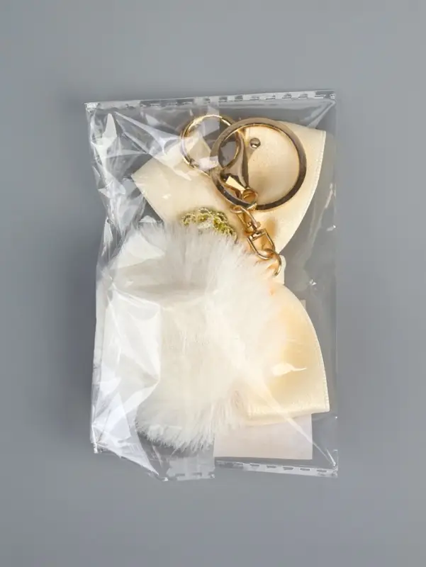 Пушистик на кольце "Бант с подвеской" белый 12х5х5 см