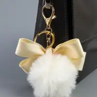 Пушистик на кольце "Бант с подвеской" белый 12х5х5 см