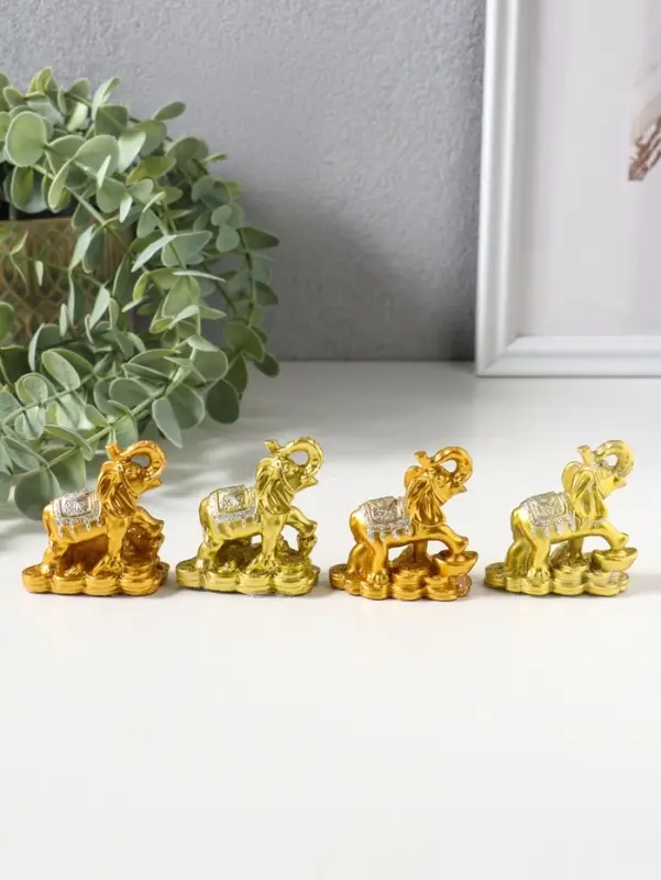 Сувенир полистоун "Слон на монетах и слитках" набор 4 шт золото 2,5х5х5 см
