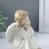 Сувенир керамика "Ангел в белом платье, сидит" 10х11х15,5 см