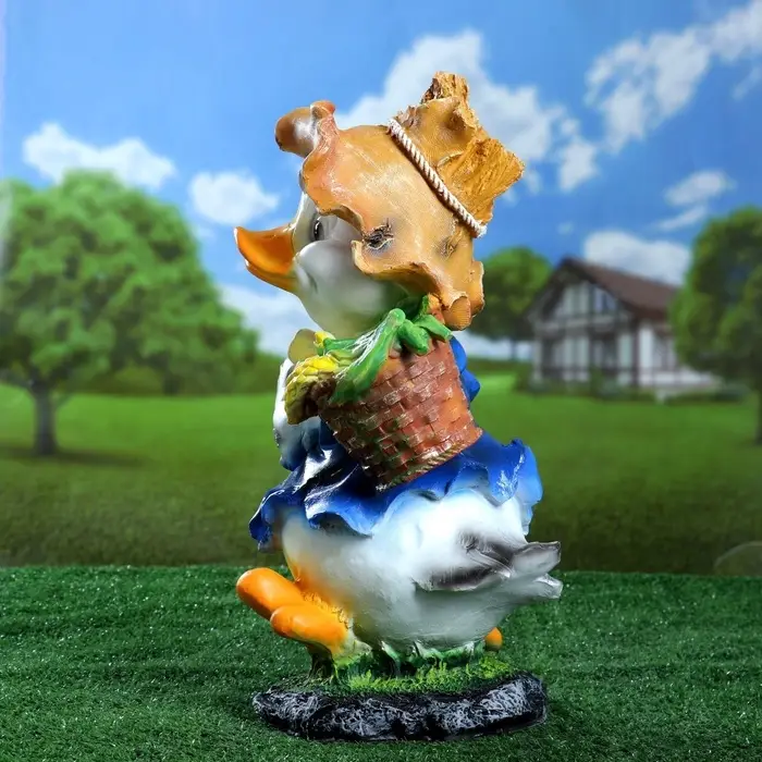 Садовая фигура из полистоуна «Утёнок с кукурузой», 48×22×26 см