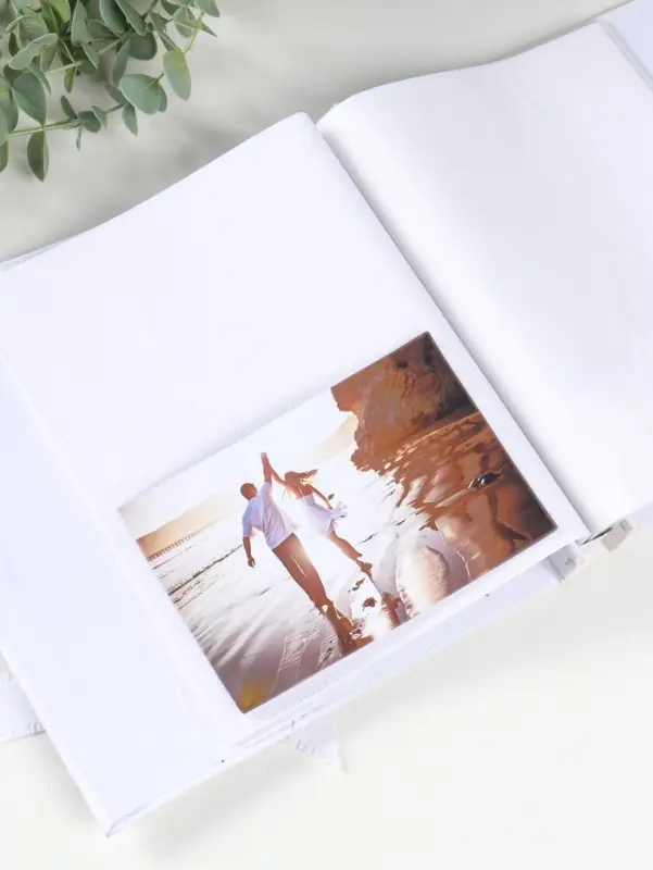 Фотоальбом на 100 фото 10х15 см "Белоснежный с бантом" в коробке 4х22х23 см