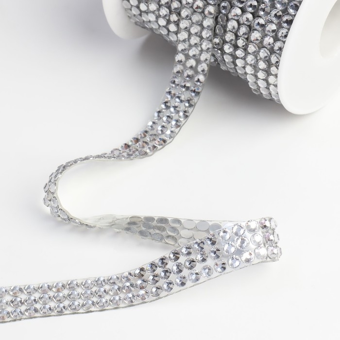 Стразы термоклеевые, d = 4 мм, ширина - 12 мм, 4,5 ± 0,5 м, цвет серебряный Стразы термоклеевые, d = 4 мм, ширина - 12 мм, 4,5 ± 0,5 м, цвет серебряный