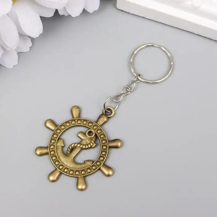 Брелок металл "Штурвал с якорем" 4,5х4 см