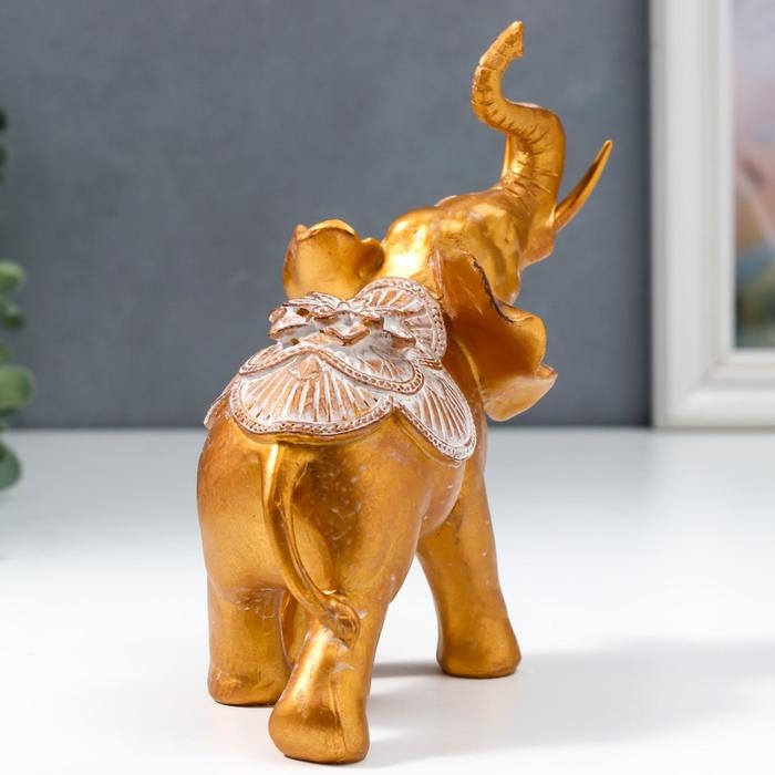 Сувенир полистоун Сувенир полистоун "Африканский слон с цветком на попоне" под бронзу 17х8,5х17 см