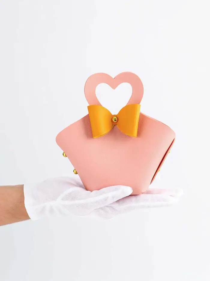 Кожаная подарочная сумочка для бижутерии и сувениров, розовая с бантом, 10.5&times;5&times;6 см