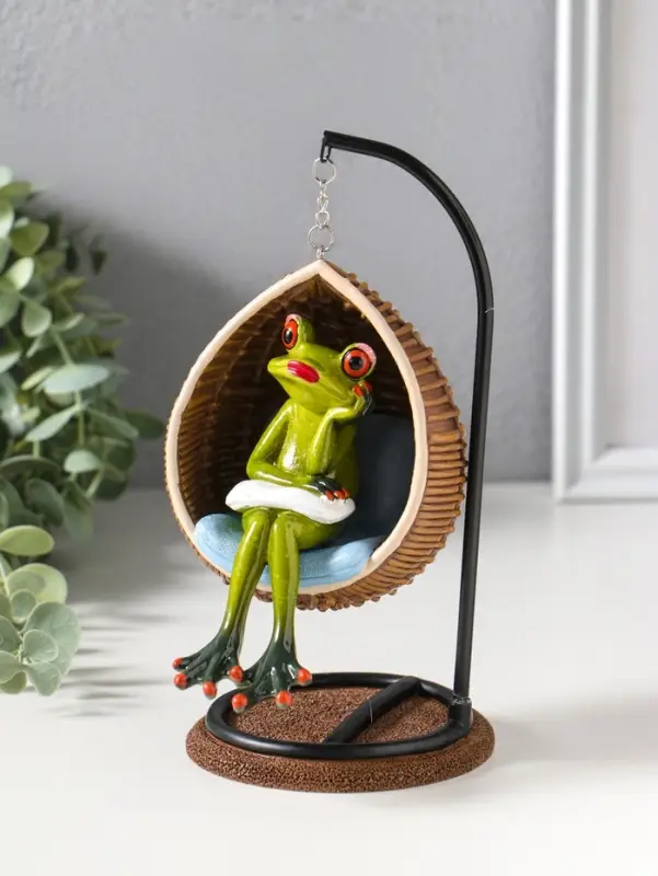 Сувенир полистоун лак "Лягуха в кресле-качеле" 12х11х18 см