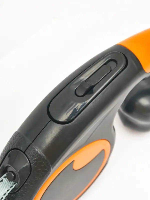 Рулетка - поводок Рулетка - поводок "Косточка", с контейнером для пакетов, трос 3 м, чёрная/оранжевая