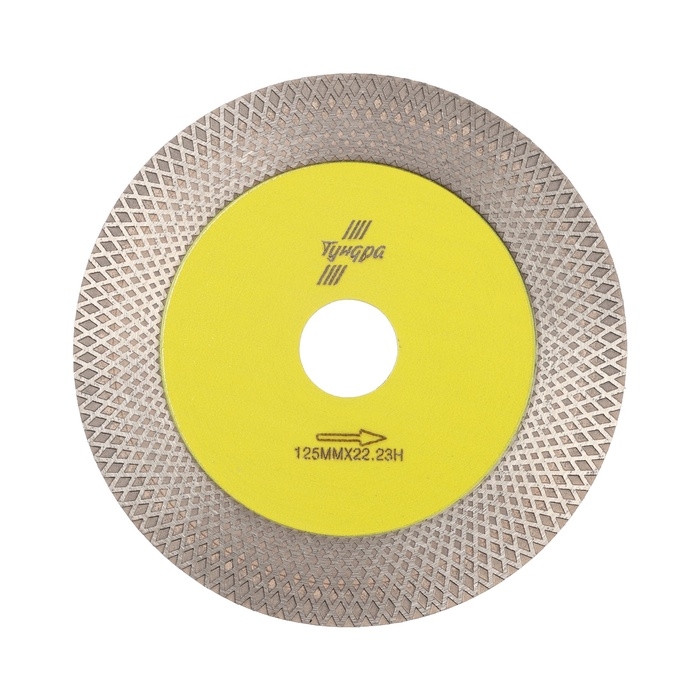 Диск алмазный для резки и шлифовки ТУНДРА, для запилов под 45 градусов, сплошной, 125 мм Диск алмазный для резки и шлифовки ТУНДРА, для запилов под 45 градусов, сплошной, 125 мм