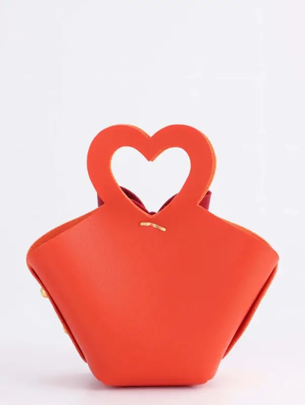 Кожаная подарочная сумочка для бижутерии и сувениров, оранжевая с бантом, 10.5&times;5&times;6 см