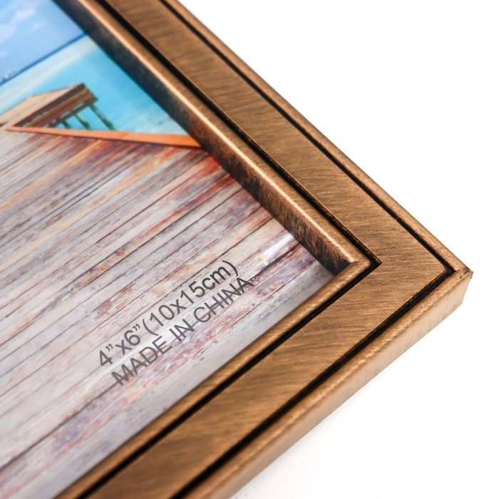 Фоторамка пластик на 10 фото 10х15 см Фоторамка пластик на 10 фото 10х15 см "Якорь и штурвал" тёмное золото 41х68 см