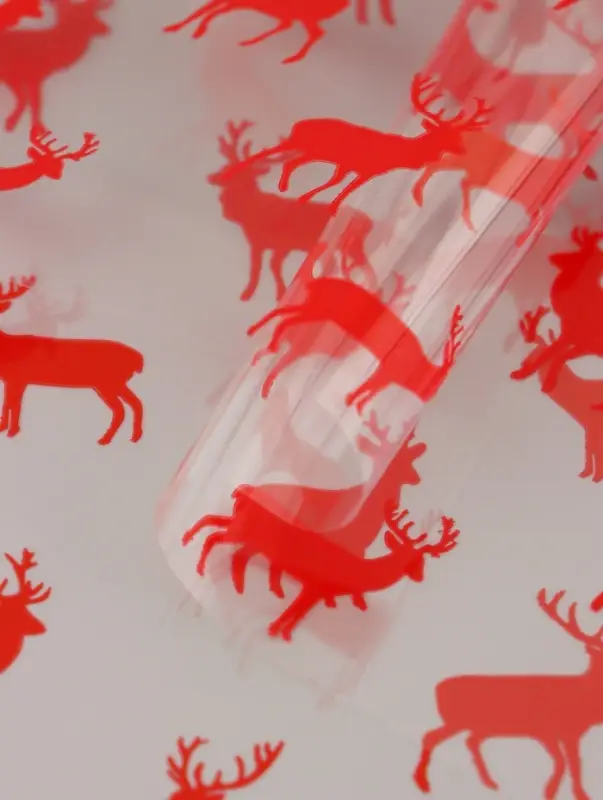 Пленка новогодняя глянцевая &laquo;Северные олени&raquo;, прозрачная, красный, 0.7&times;7.5 м, 40 мкм, 200 г