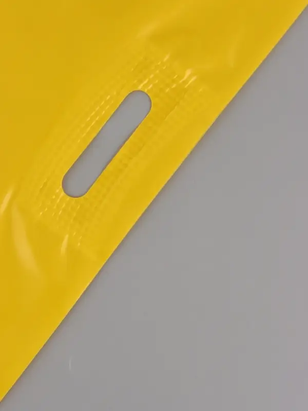 Пакет полиэтиленовый с вырубной ручкой, Желтый 50-60 См, 70 мкм