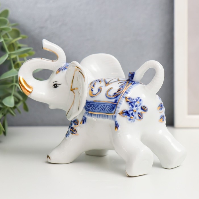 Сувенир керамика Сувенир керамика "Слоны с синей росписью" набор 7 шт h= 11 см 31,5х23,5 см