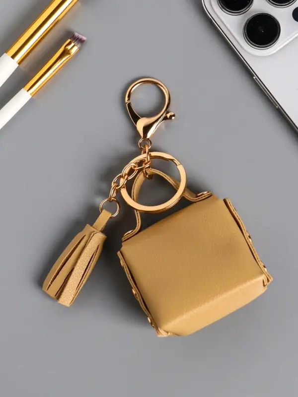 Брелок кожзам с карабином, с кистью Брелок кожзам с карабином, с кистью "Сумочка. Котик" сливочный 5х2,5х6 см