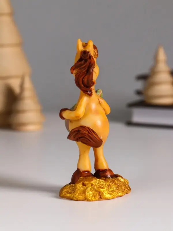 Сувенир полистоун Сувенир полистоун "Коник на монетах с мешком золота" 4х3,6х9 см