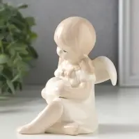 Сувенир керамика "Девочка-ангел в платьице с бантиком, держит сердце" 8,8х7,5х10,3 см