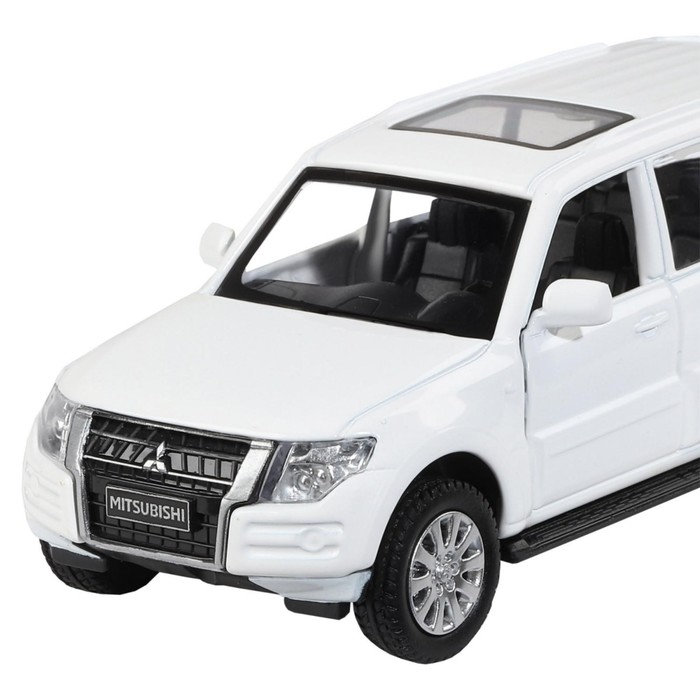 Машина металлическая Mitsubishi Pajero 4WD Turbo 1:43, инерция, открываются двери, цвет белый Машина металлическая Mitsubishi Pajero 4WD Turbo 1:43, инерция, открываются двери, цвет белый
