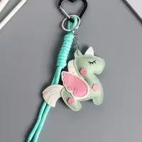 Брелок на карабине кожзам, текстиль "Единорог с крыльями" зелёный, с узлом 24х10,5х1,5 см