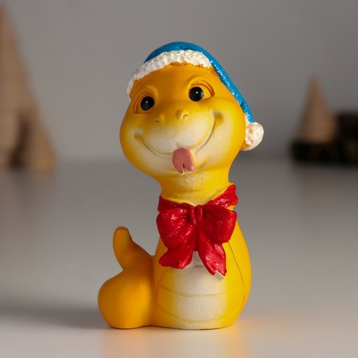 Сувенир полистоун Сувенир полистоун "Змейка жёлтая в синей шапке и красном бантике" 5х4х9 см