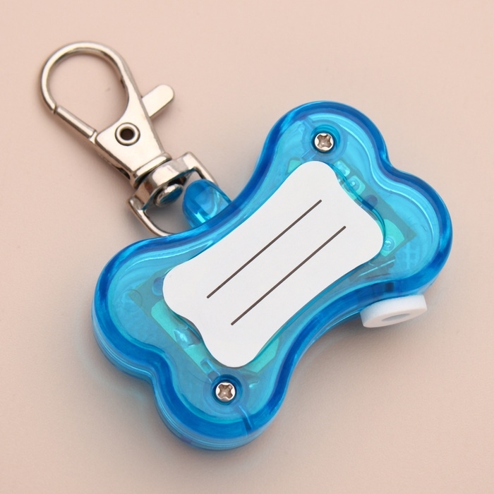 Маячок-адресник Косточка с наклейкой под записку 3 режима свечения голубой Маячок-адресник Косточка с наклейкой под записку 3 режима свечения голубой