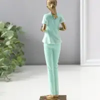 Сувенир полистоун "Медсестра в зелёном костюме с подносом с лекарствами" 23,5 см