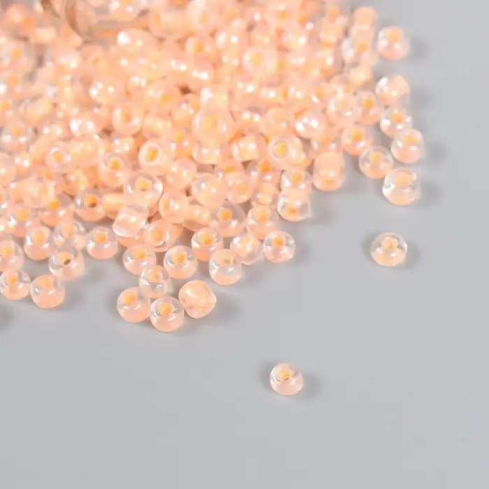 Бисер 8/0 в бутылочке  Бисер 8/0 в бутылочке "Полупрозрачный с цв.серединой. Коралл" светится под УФ 20 гр 6х2х2 см