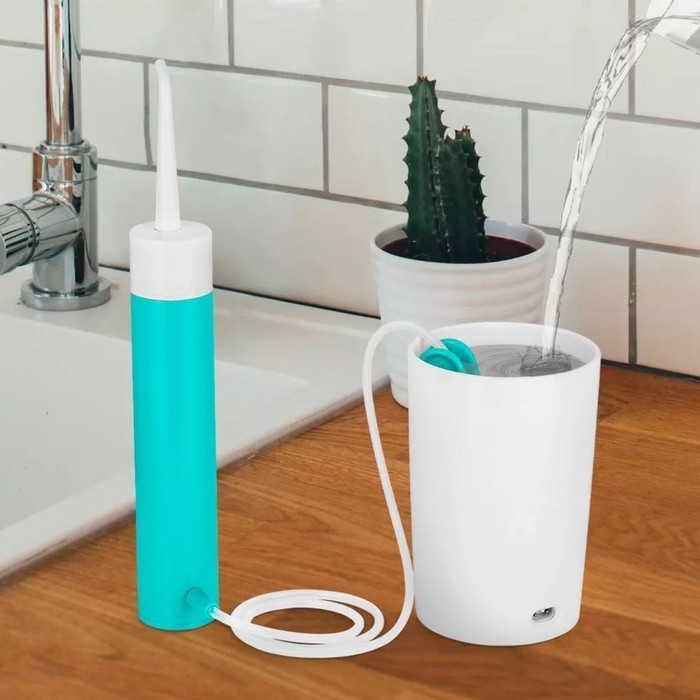 Ирригатор Kitfort КТ-2957-3, портативный, 320 мл, 3 режима, 2 насадки, от АКБ, бело-голубой Ирригатор Kitfort КТ-2957-3, портативный, 320 мл, 3 режима, 2 насадки, от АКБ, бело-голубой