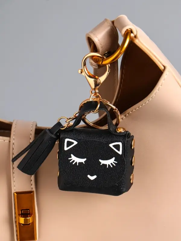 Брелок кожзам с карабином, с кистью Брелок кожзам с карабином, с кистью "Сумочка. Котик" чёрный 5х2,5х6 см