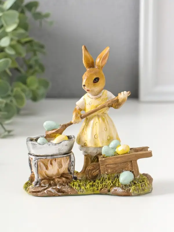 Сувенир полистоун "Зайка в жёлтом платье, красит пасхальные яички" 12,5 см